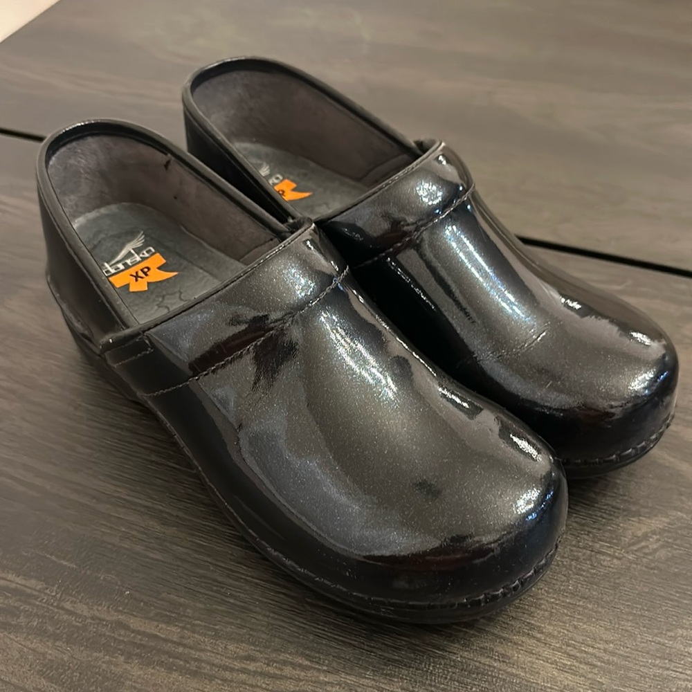 Dansko Women's Black Patent Clogs